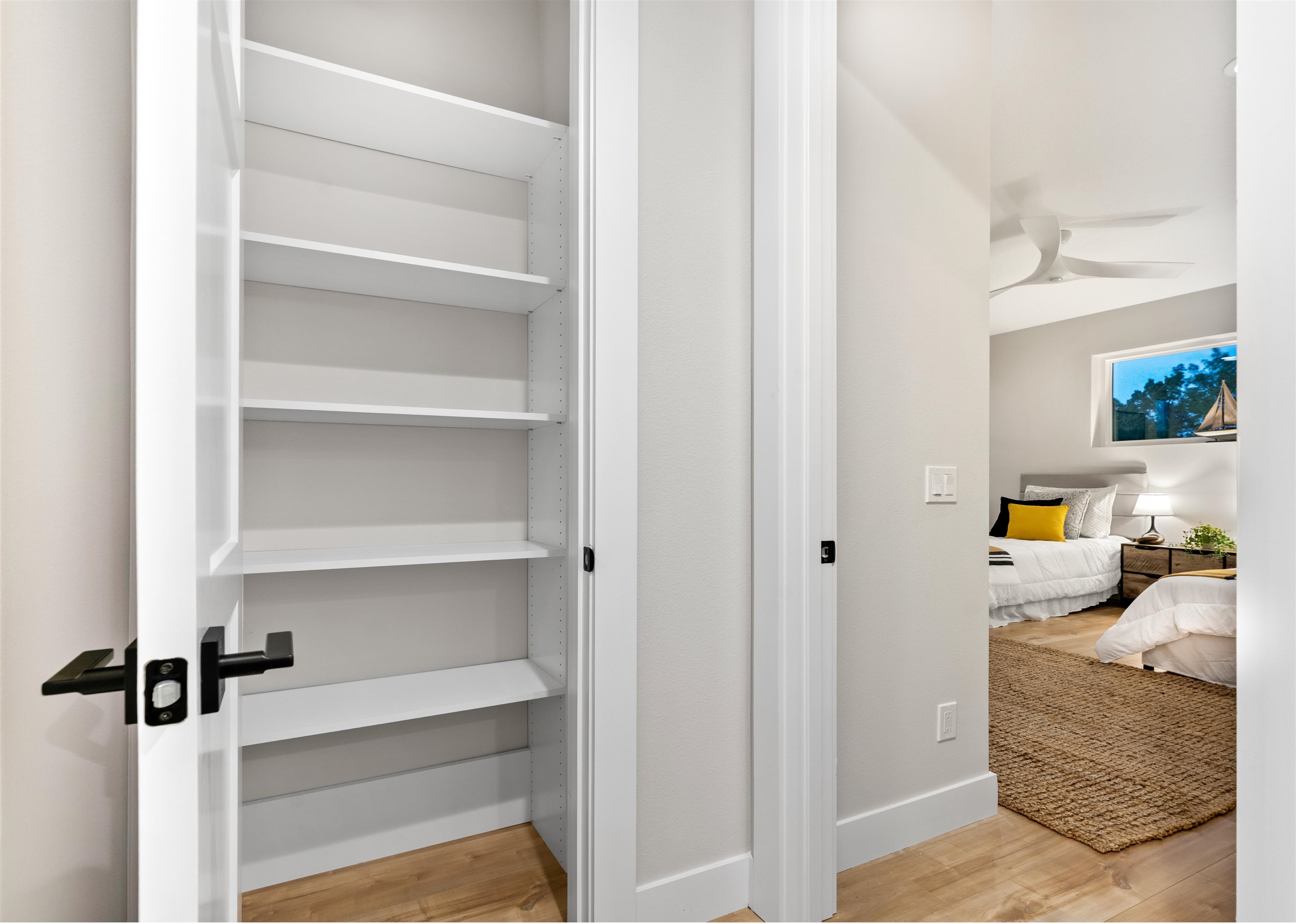 2549 Palm Avenue Flagler Beach, FL 32136 - Photo 37 of 70 a view of walk in closet with clothes and shoes