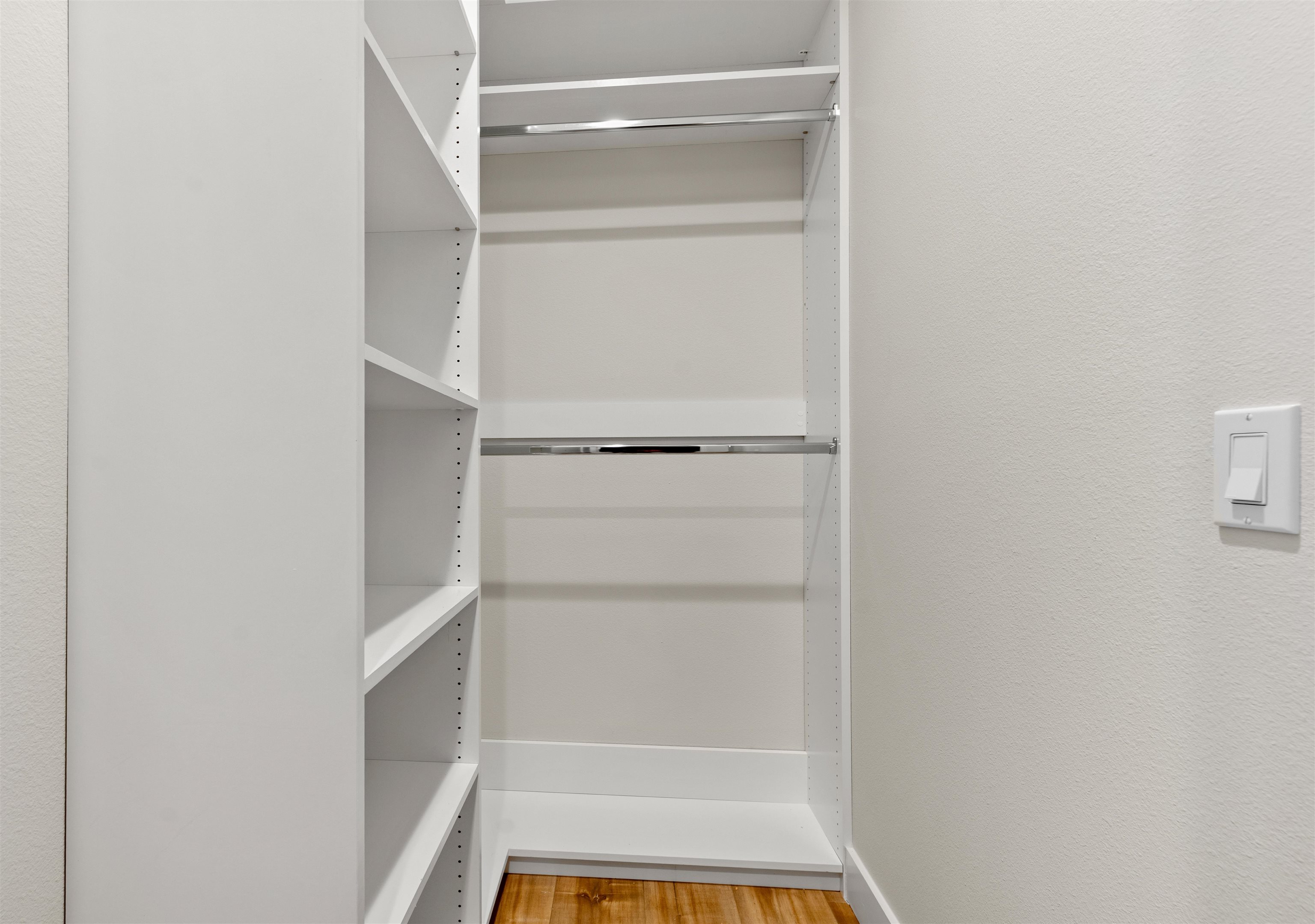 2549 Palm Avenue Flagler Beach, FL 32136 - Photo 46 of 65 a view of walk in closet with empty racks