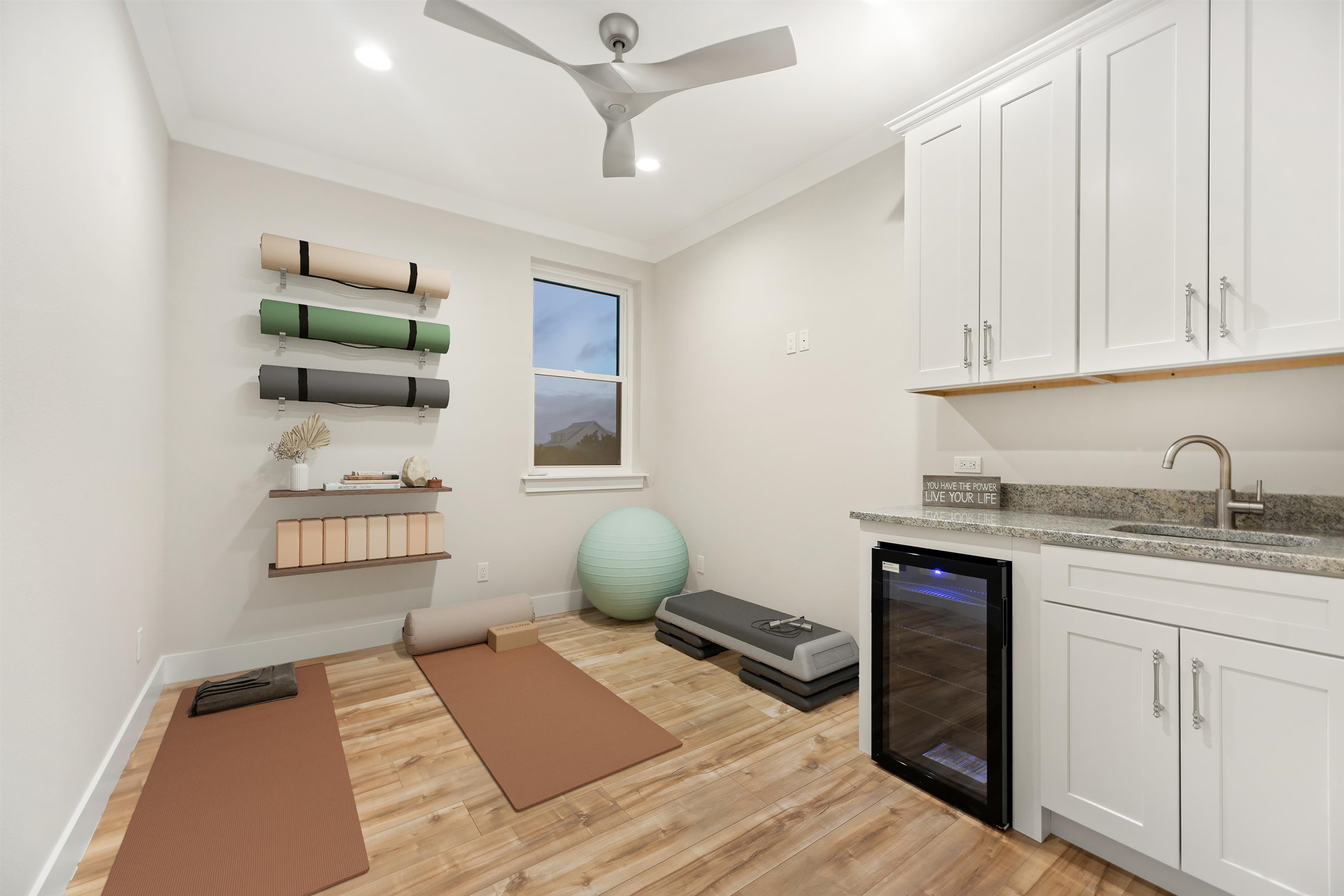 2549 Palm Avenue Flagler Beach, FL 32136 - Photo 59 of 65 Workout area with beverage cooler, light wood-type flooring, crown molding, ceiling fan, and recessed lighting