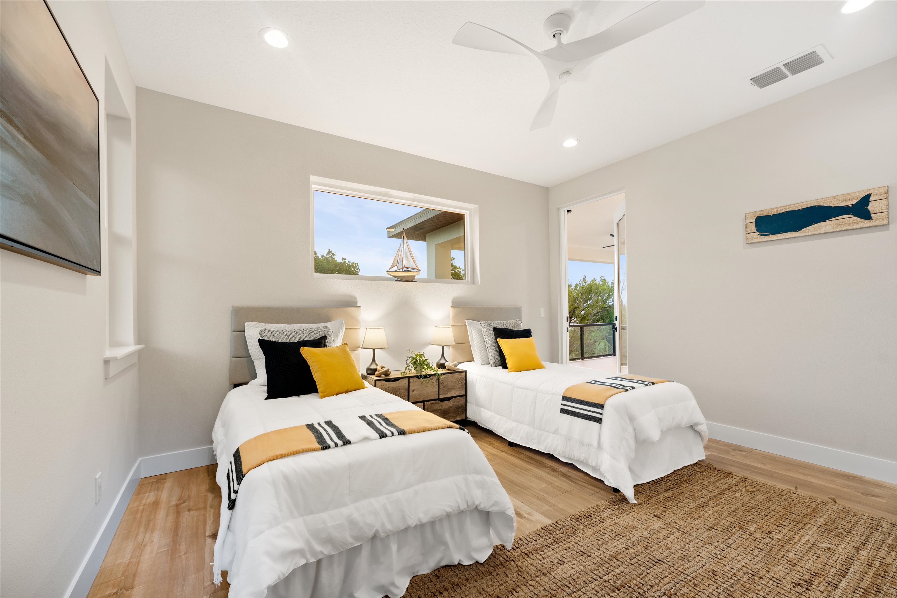 2549 Palm Avenue Flagler Beach, FL 32136 - Photo 62 of 70 a bedroom with two beds and painting on the wall