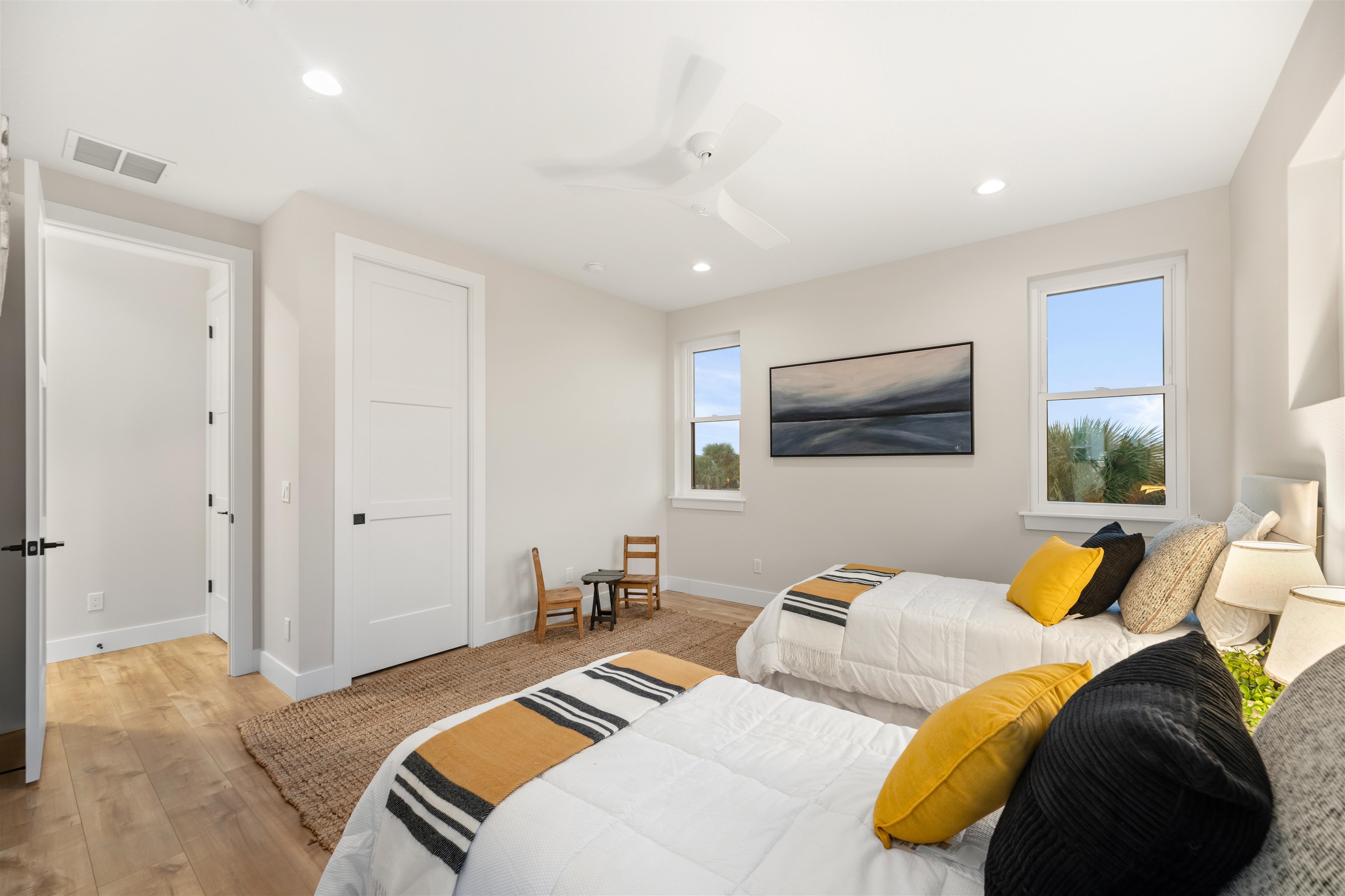 2549 Palm Avenue Flagler Beach, FL 32136 - Photo 64 of 70 a bedroom with two beds and a flat screen tv