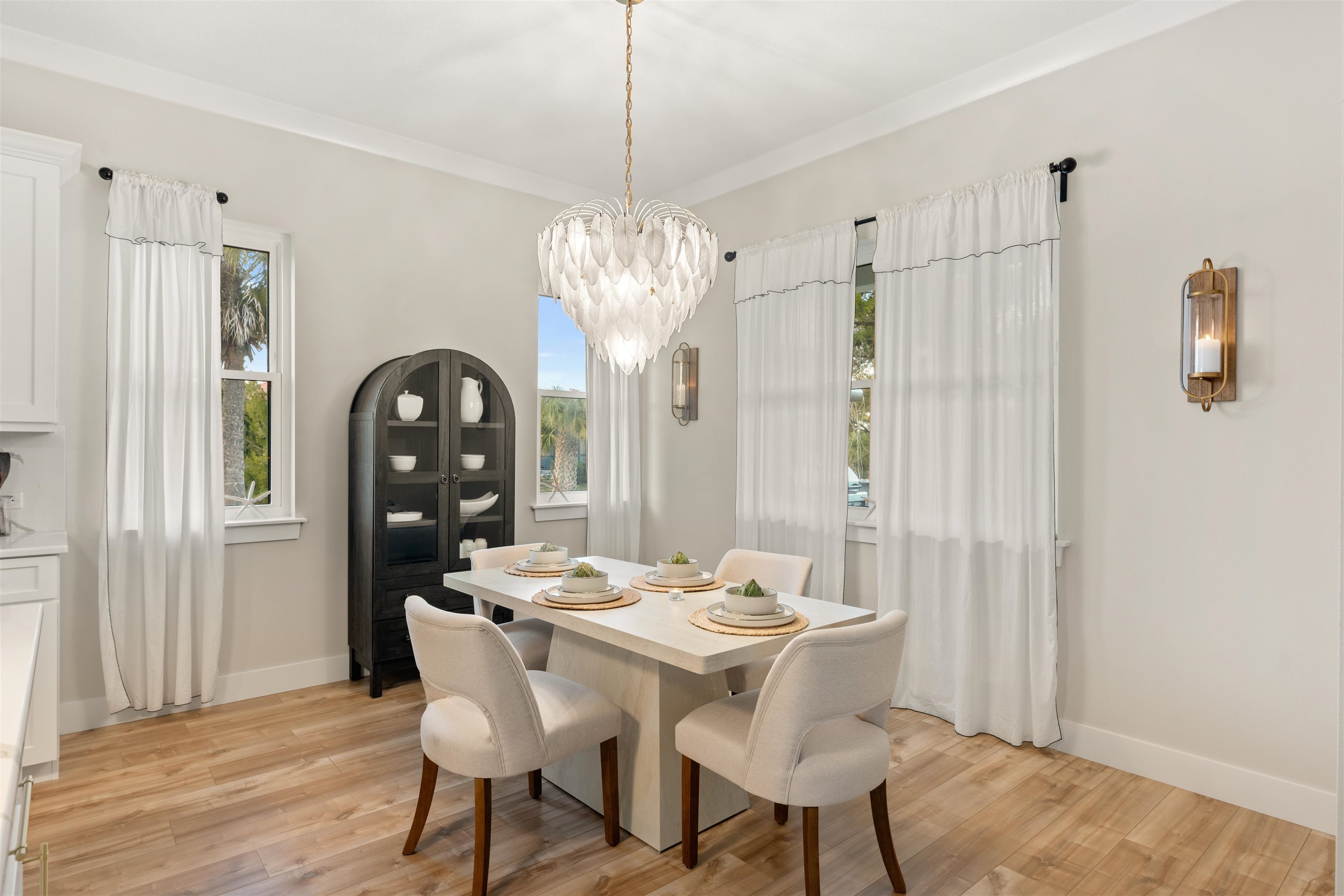 2549 Palm Avenue Flagler Beach, FL 32136 - Photo 7 of 65 a view of a dining room with furniture window and wooden floor