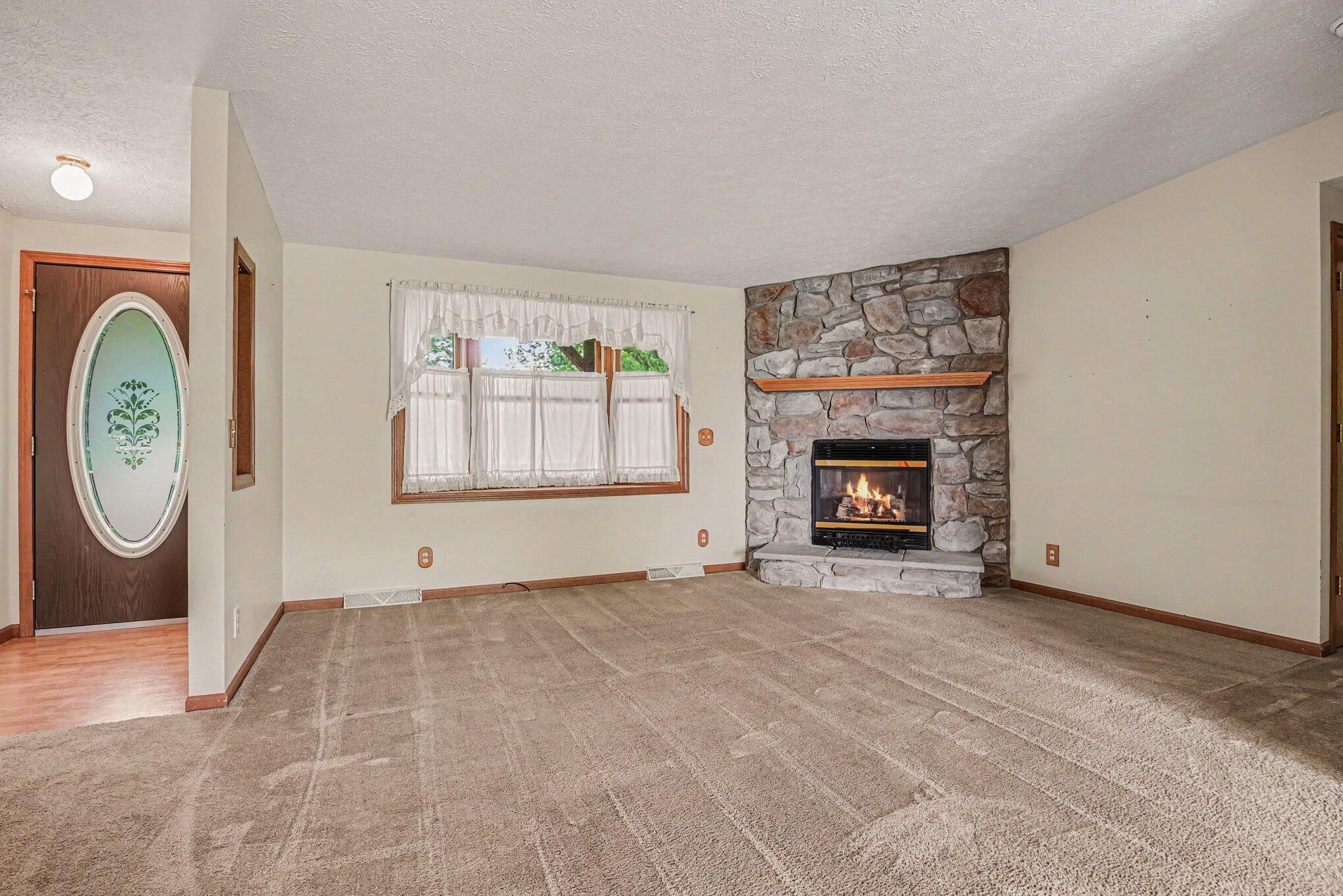 69728 Calvin Center Road Edwardsburg, MI 49112 - Photo 2 of 26 69728 Calvin Center Rd.Living Rm
