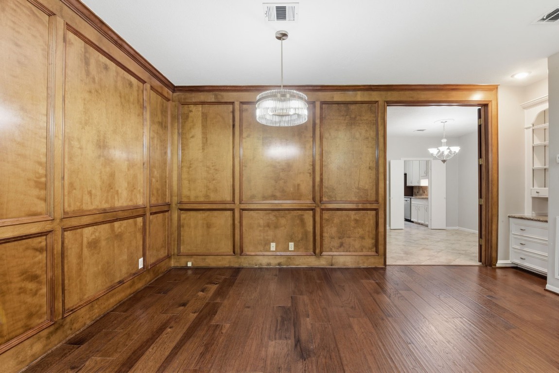 727 Bunker Hill Road, Unit 34 Houston, TX 77024 - Photo 12 of 50 Living area with open French doors leading to the formal dining area