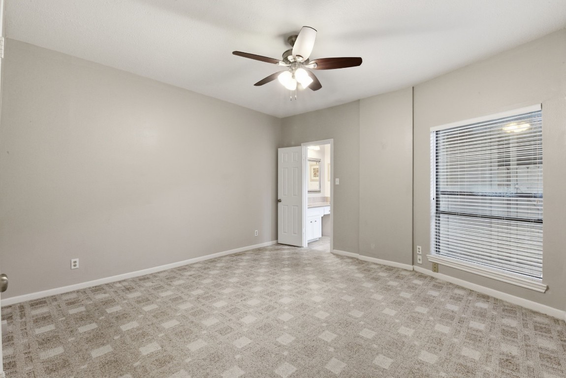 727 Bunker Hill Road, Unit 34 Houston, TX 77024 - Photo 24 of 50 Spacious primary bedroom conveniently located on the main floor