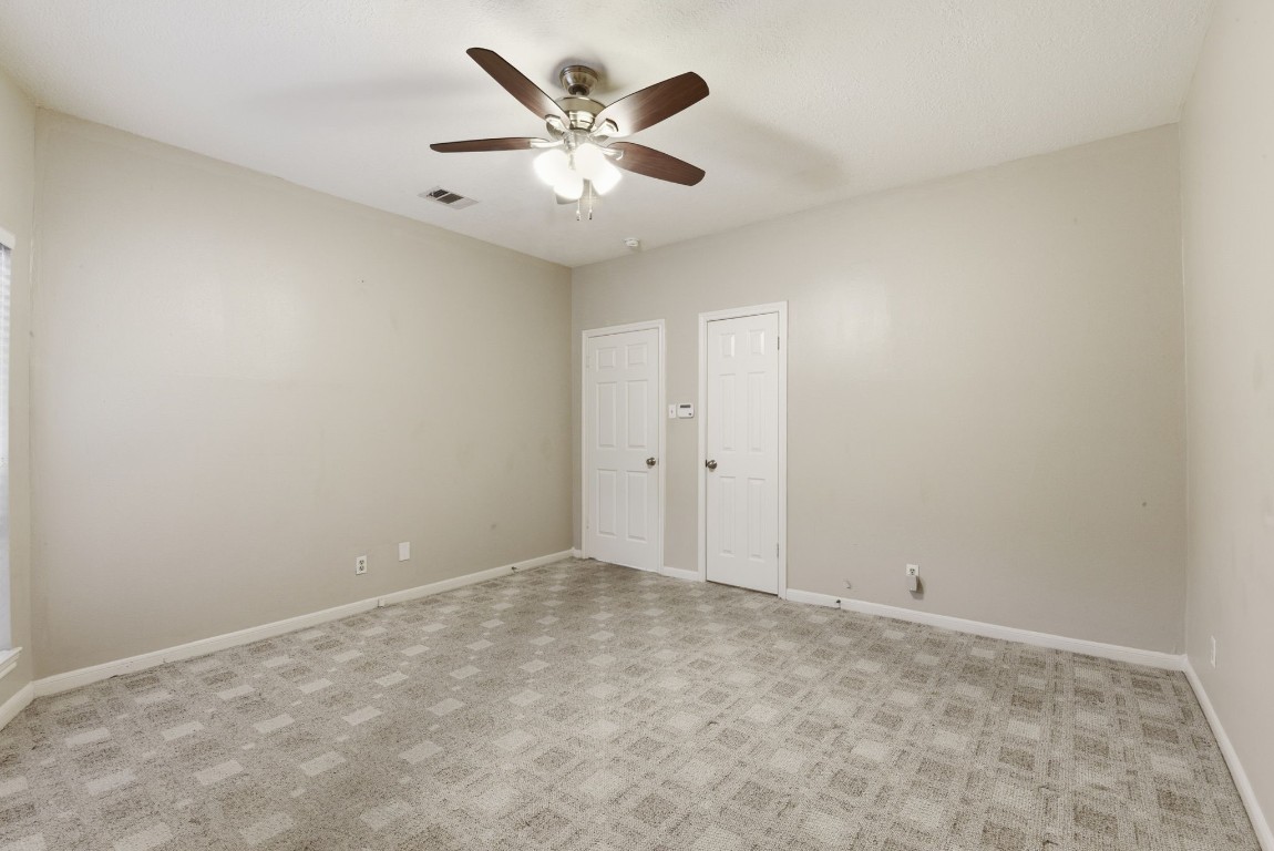 727 Bunker Hill Road, Unit 34 Houston, TX 77024 - Photo 25 of 50 Generously sized bedroom featuring a walk-in closet