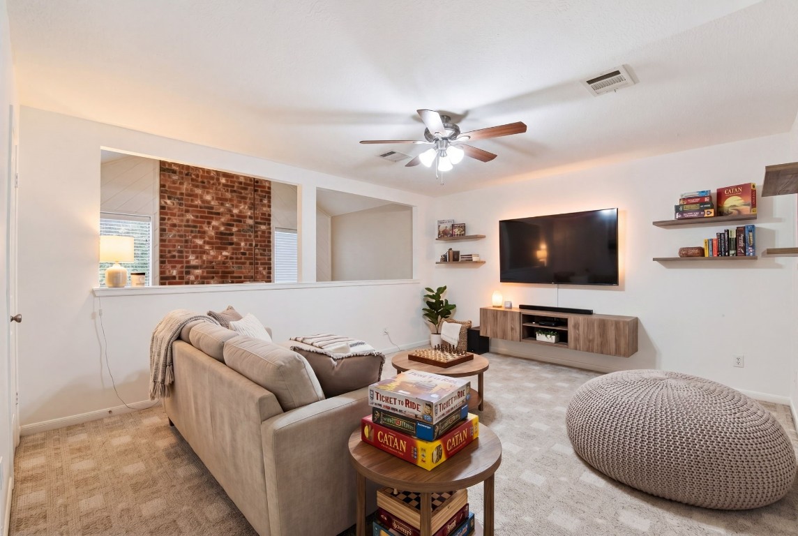 727 Bunker Hill Road, Unit 34 Houston, TX 77024 - Photo 35 of 50 Expansive upstairs game room with plenty of space to entertain (virtually staged)