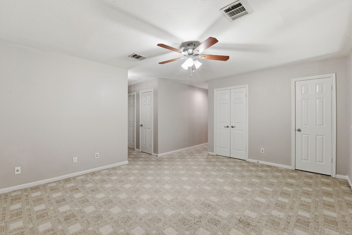 727 Bunker Hill Road, Unit 34 Houston, TX 77024 - Photo 37 of 50 Expansive upstairs game room— open view to two adjoining bedrooms