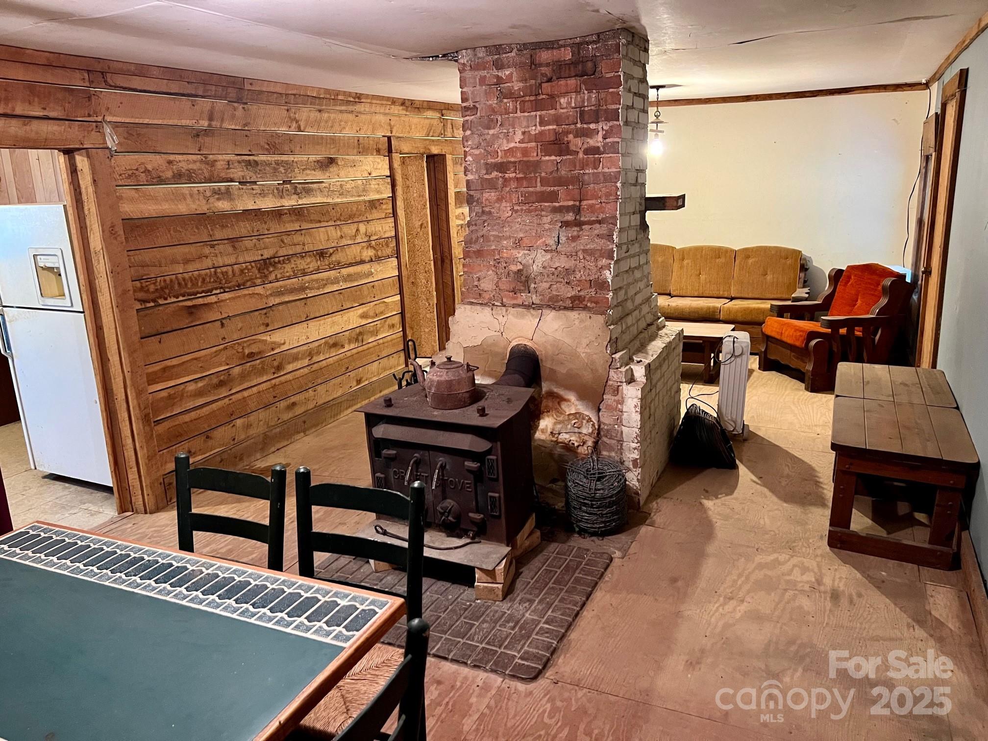 8277 Lockhart Road Sharon, SC 29742 - Photo 4 of 48 a living room with furniture and a fireplace