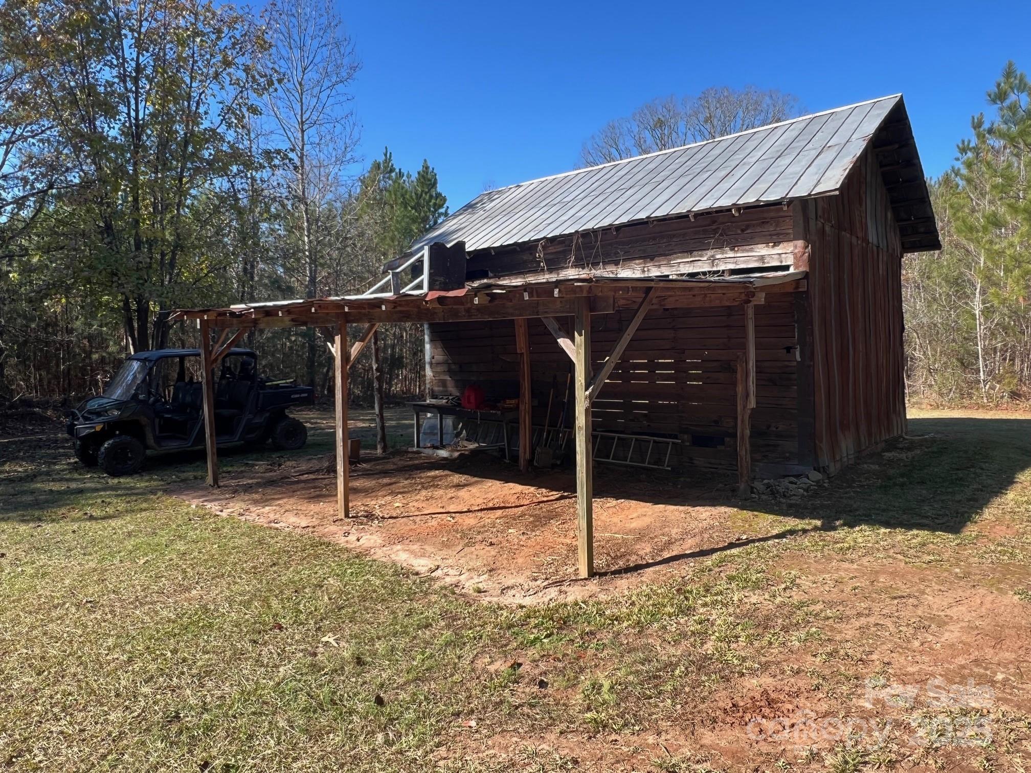 8277 Lockhart Road Sharon, SC 29742 - Photo 7 of 48 a view of a house with a yard