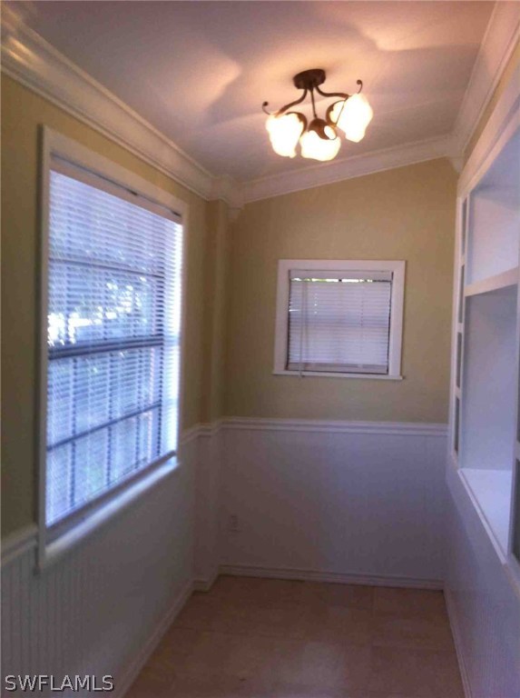 17 Iowa Road Lehigh Acres, FL 33936 - Photo 5 of 18 a view of empty room with windows