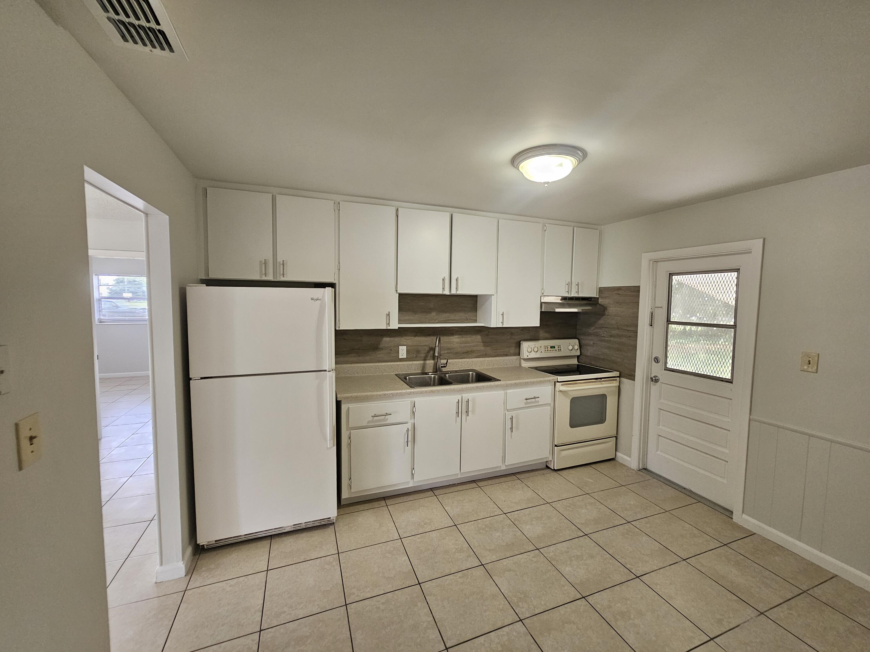 2031 Hugo Road Fort Pierce, FL 34946 - Photo 4 of 20 20260511_114844