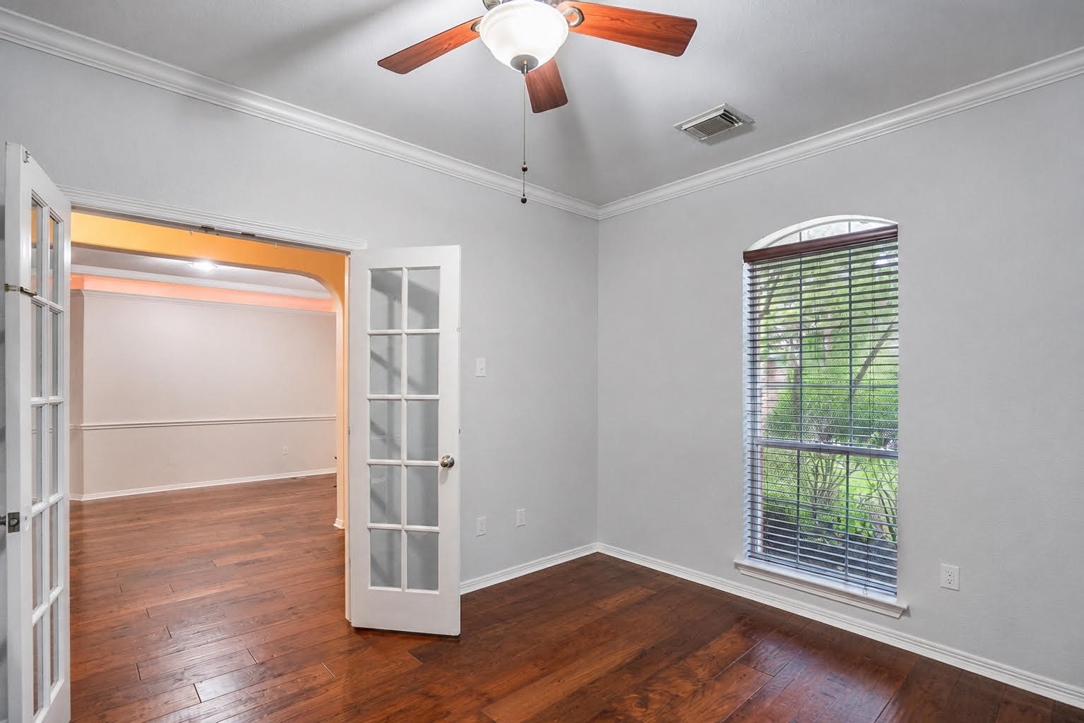 10410 Pitcataway Drive Spring, TX 77379 - Photo 7 of 47 From the home office you have access to a large window that streams in light and allows you to greet guests and see nature beyond.