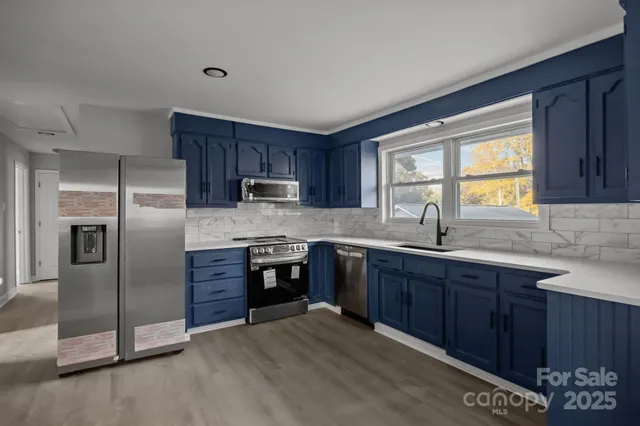 a kitchen with a sink and a window