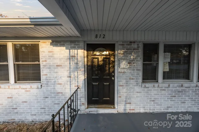 a front view of a house with shower