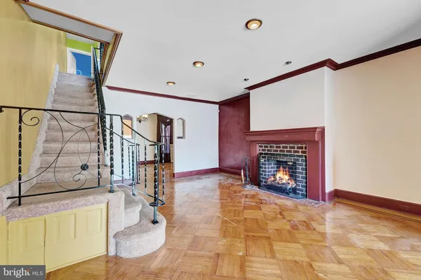 a view of an entryway with fireplace