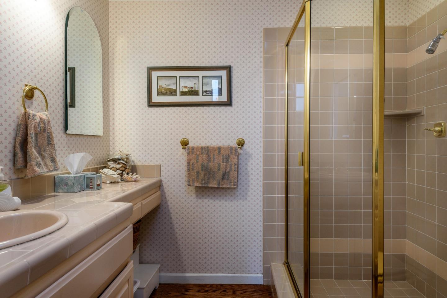 364 Genevieve Avenue Pacifica, CA 94044 - Photo 12 of 24 a bathroom with a sink and a mirror