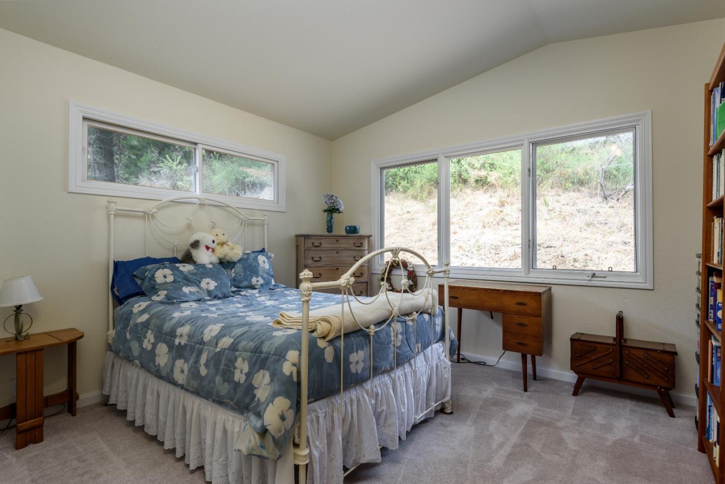 364 Genevieve Avenue Pacifica, CA 94044 - Photo 19 of 24 a bed room with two beds and a large window