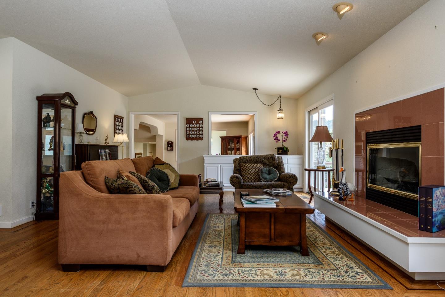 364 Genevieve Avenue Pacifica, CA 94044 - Photo 4 of 24 a living room with furniture and a flat screen tv