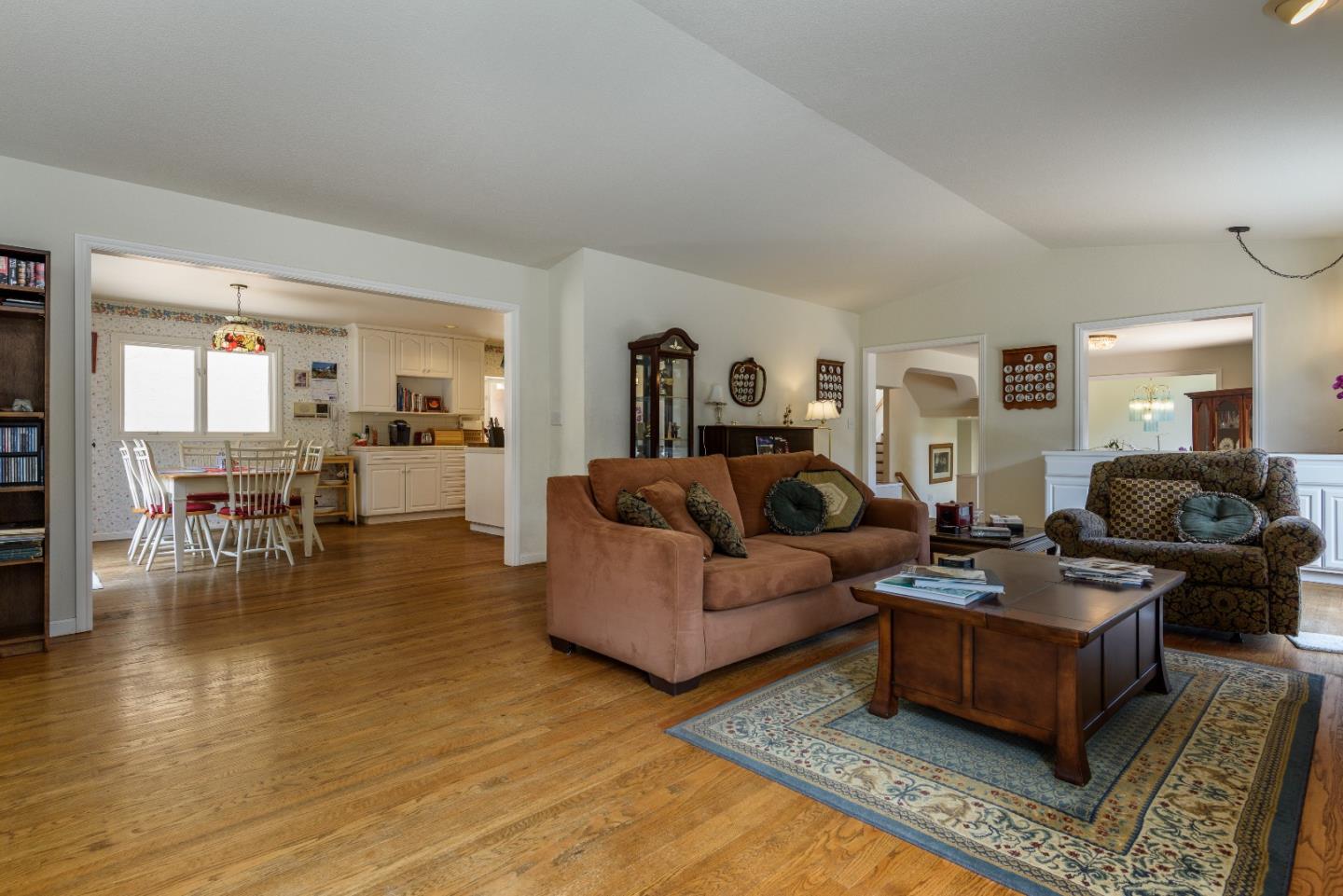 364 Genevieve Avenue Pacifica, CA 94044 - Photo 6 of 24 a living room with furniture and wooden floor