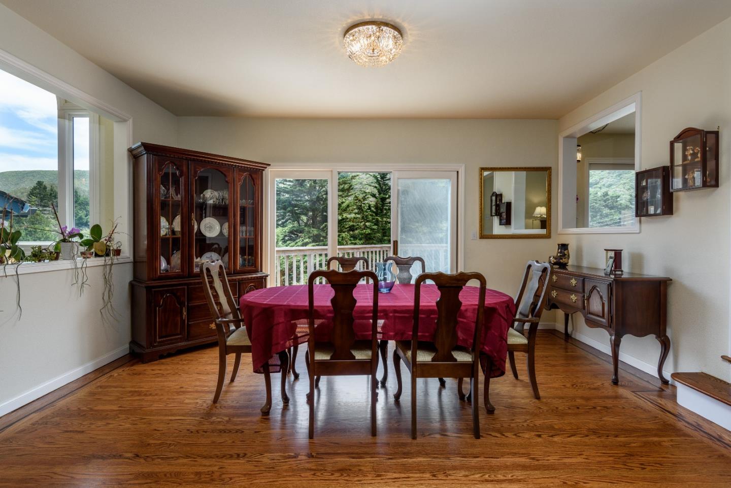 364 Genevieve Avenue Pacifica, CA 94044 - Photo 10 of 24 a view of a dining room with furniture window and wooden floor