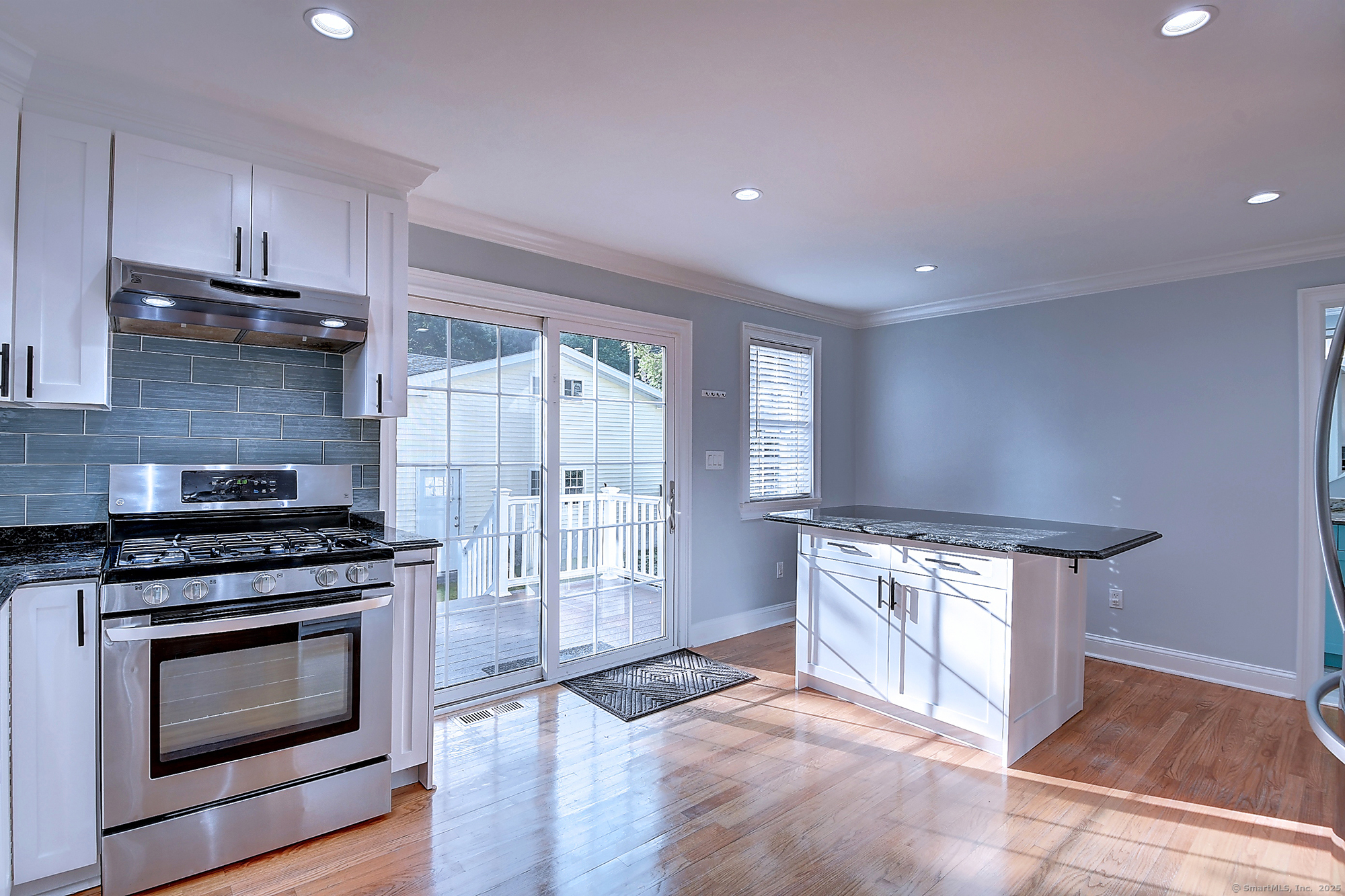 631 High Street Naugatuck, CT 06770 - Photo 11 of 36 a kitchen with a stove top oven and cabinets