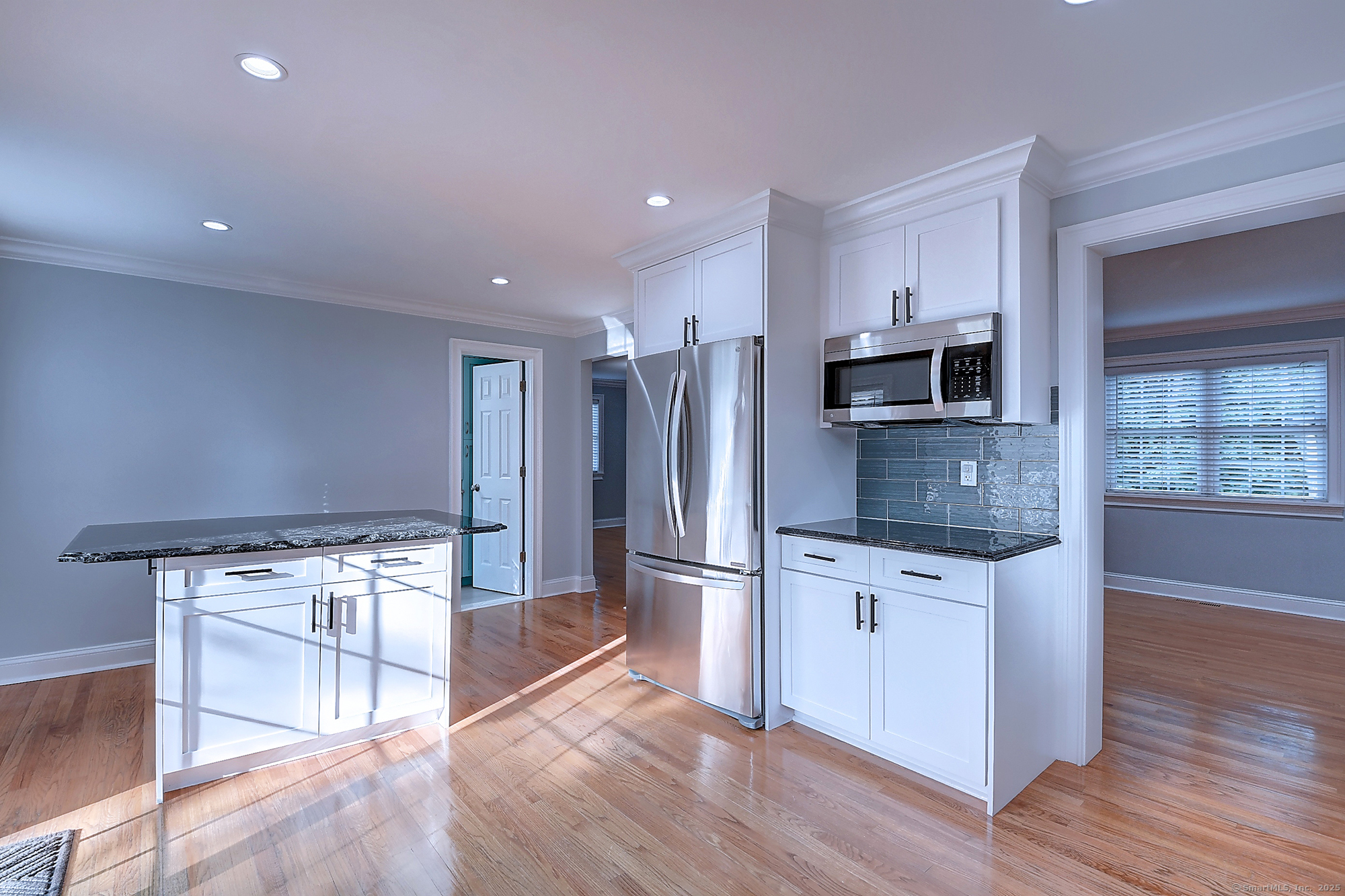 631 High Street Naugatuck, CT 06770 - Photo 13 of 36 a kitchen with granite countertop a stove a sink and a refrigerator