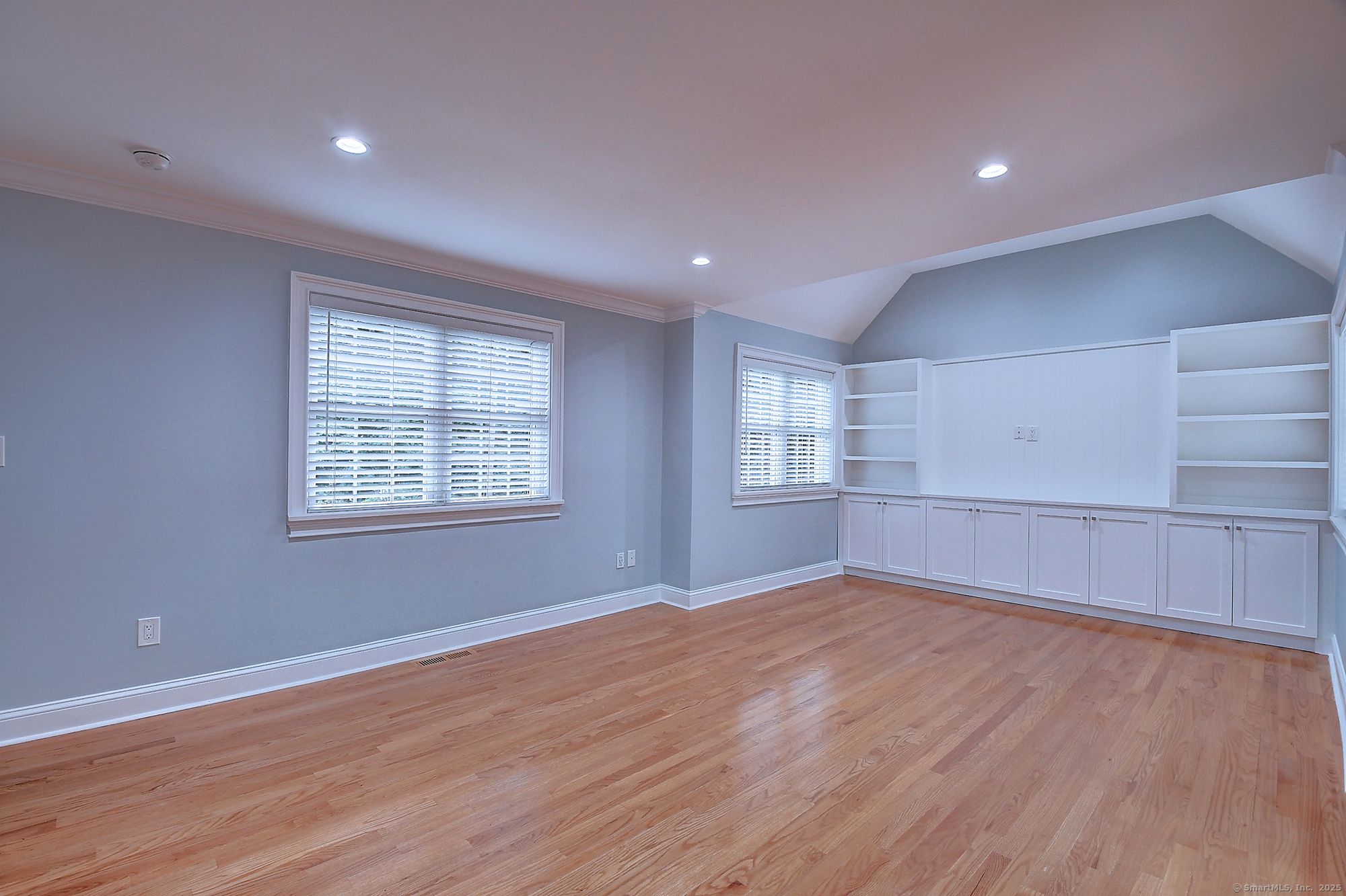631 High Street Naugatuck, CT 06770 - Photo 15 of 36 an empty room with wooden floor and windows