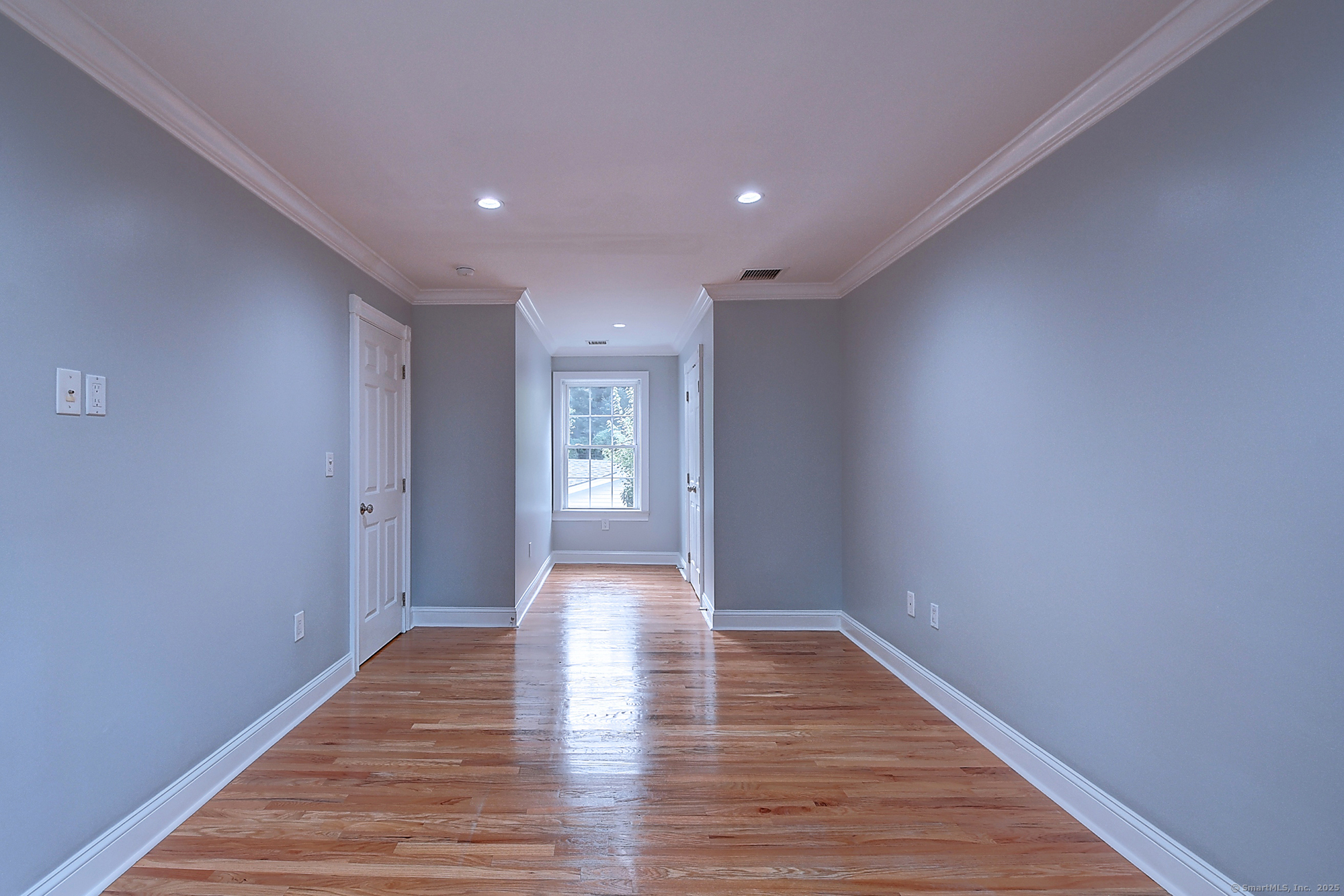 631 High Street Naugatuck, CT 06770 - Photo 18 of 36 a view of a hallway with wooden floor