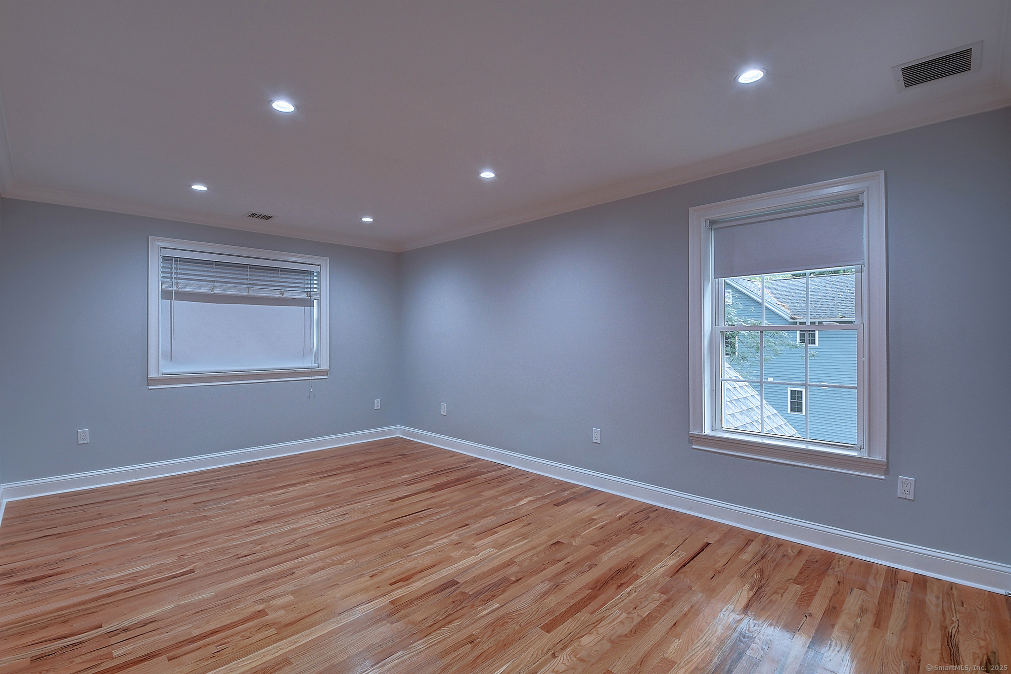 631 High Street Naugatuck, CT 06770 - Photo 20 of 36 a view of empty room with wooden floor and fan
