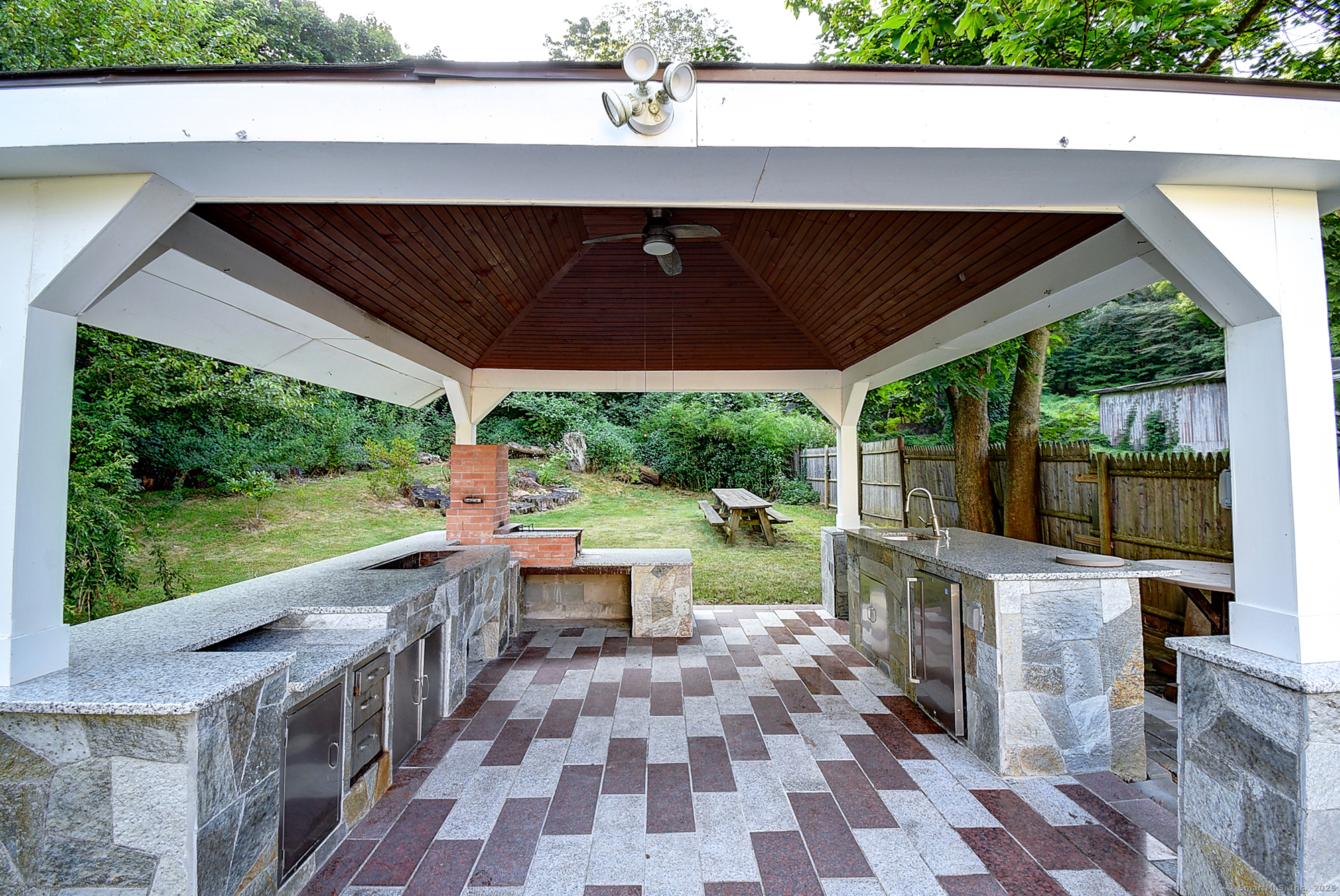 631 High Street Naugatuck, CT 06770 - Photo 8 of 36 a patio with glass top table and chairs