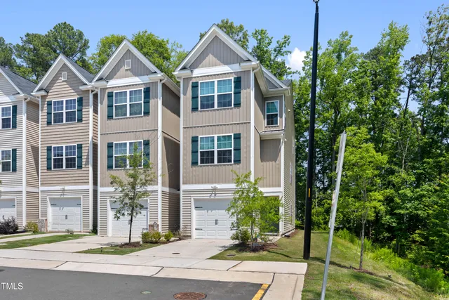 front view of a house with a garden