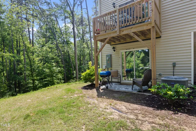 a view of a chairs and table in the patio