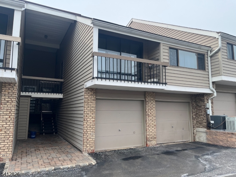 a view of a house with a garage