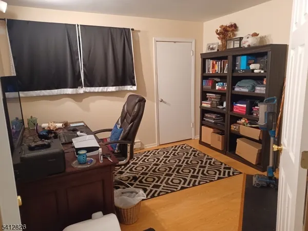 a view of workspace with cabinets