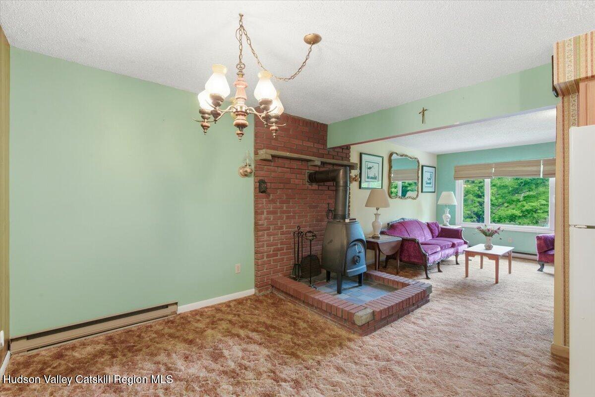 125 Reme Road Prattsville, NY 12468 - Photo 7 of 35 07-Dining to Living Room