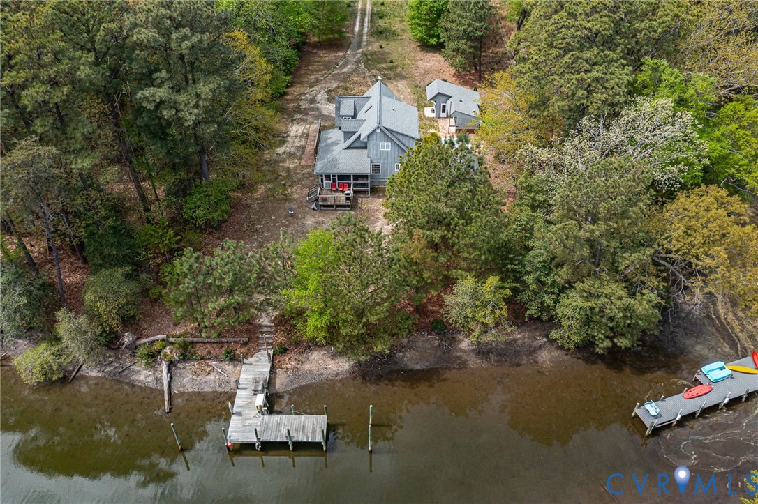 193 Deep Water Lane Reedville, VA 22539 - Photo 48 of 84 an aerial view of a house with a yard lake house and outdoor seating