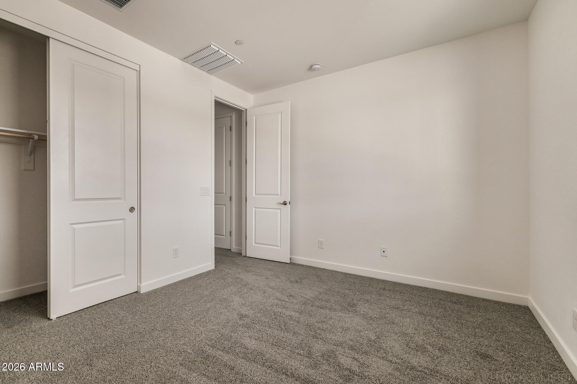 20618 West Thomas Road Buckeye, AZ 85396 - Photo 22 of 38 an empty room with closet