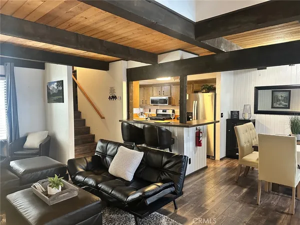 a living room with furniture and a couch