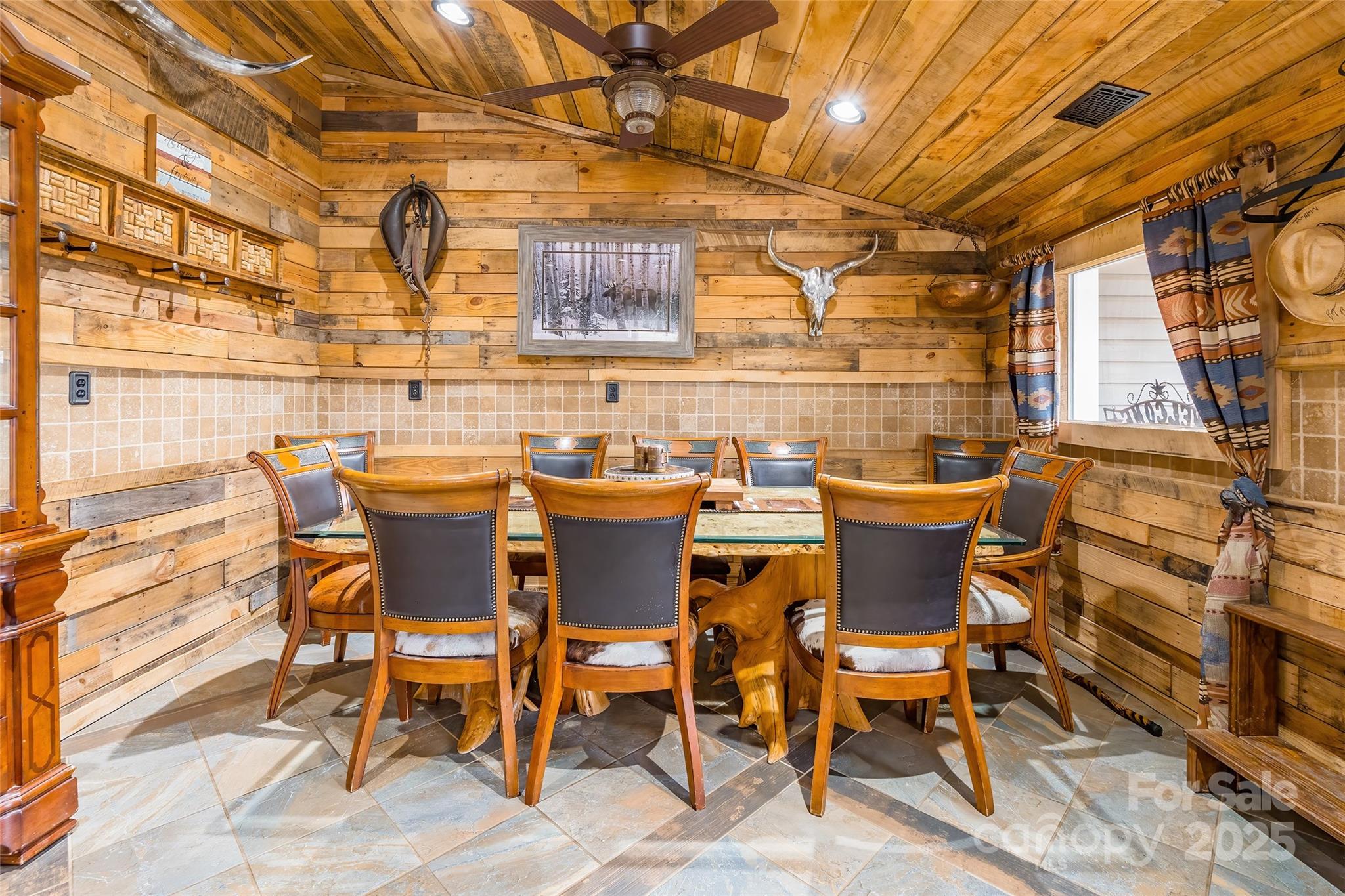 375 West Rambo Road Rock Hill, SC 29730 - Photo 11 of 48 a dining room with a wooden table and chairs