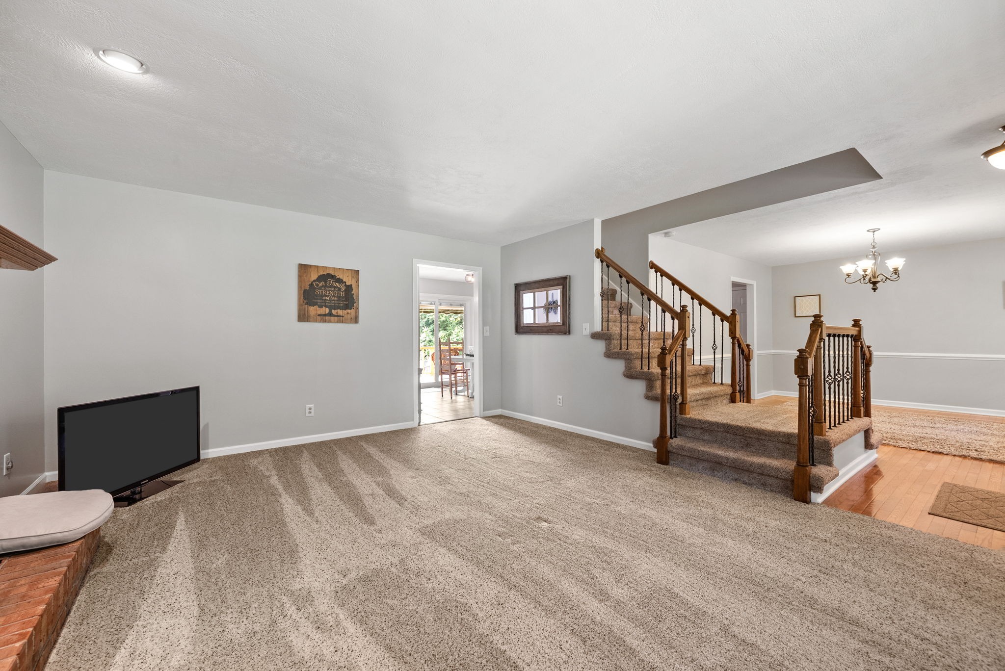 915 Rocky Hollow Road Erin, TN 37061 - Photo 11 of 49 a view of an empty room with stairs