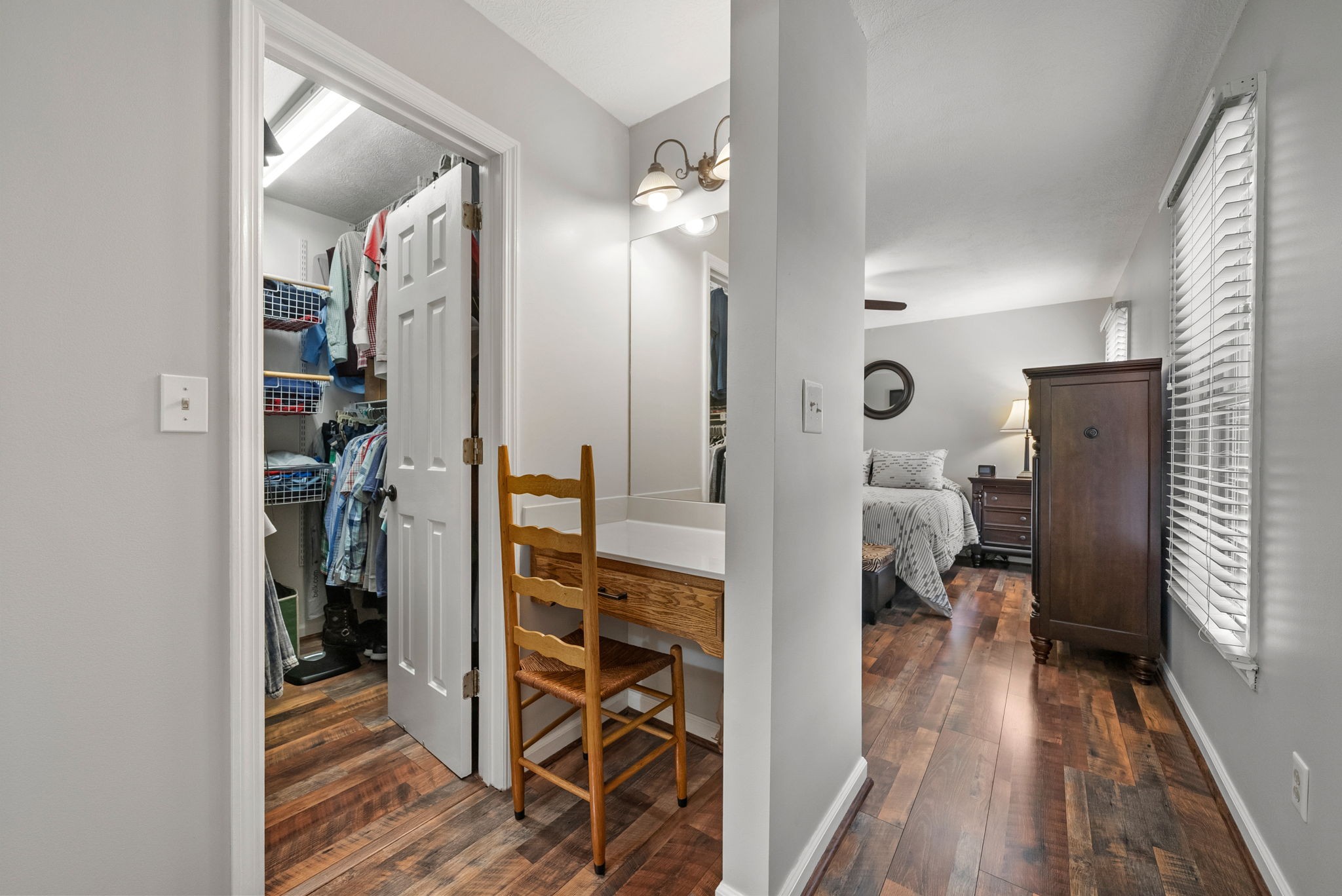 915 Rocky Hollow Road Erin, TN 37061 - Photo 18 of 49 a walk in closet with wooden floor
