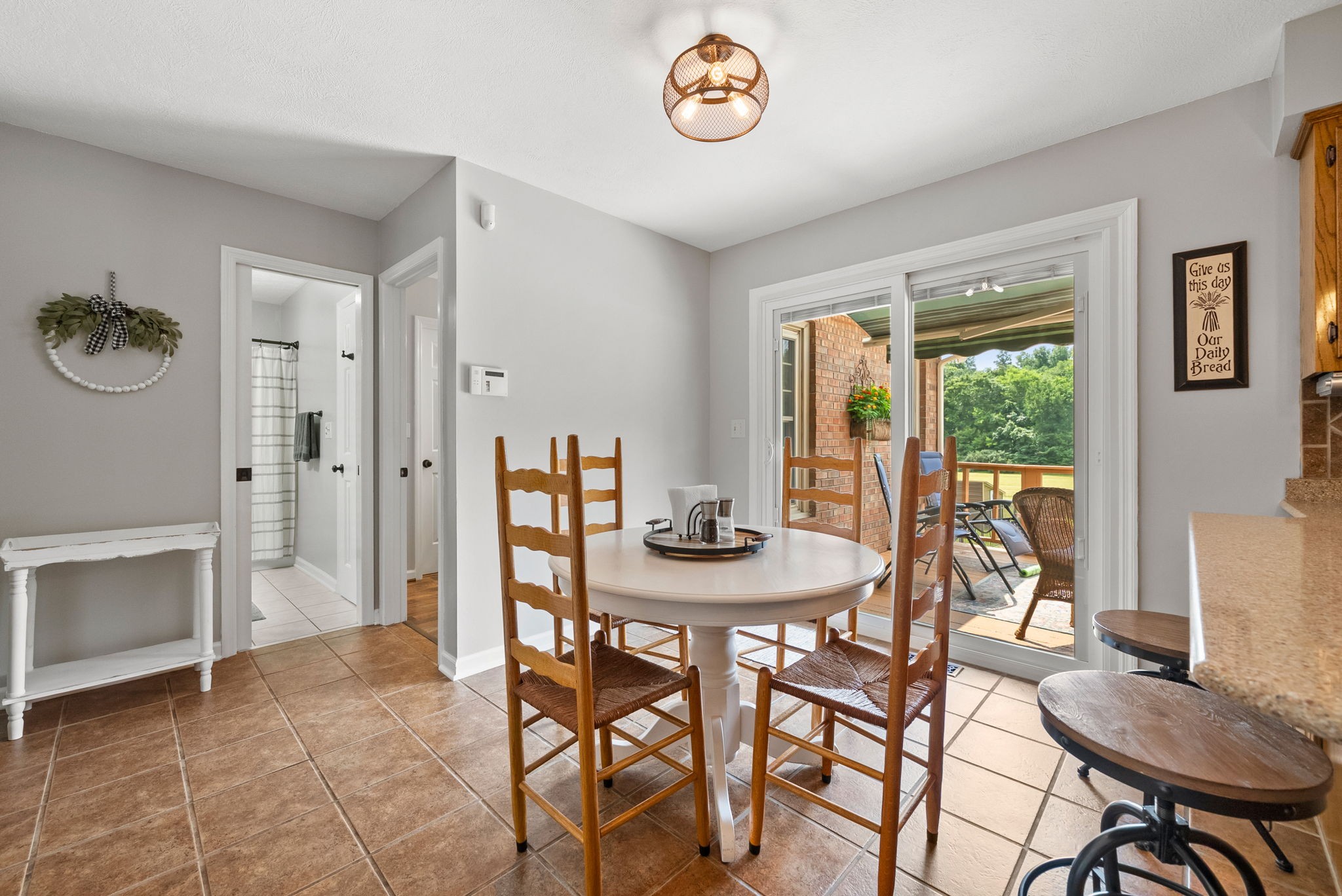 915 Rocky Hollow Road Erin, TN 37061 - Photo 18 of 49 a view of a dining room with furniture window and outside view