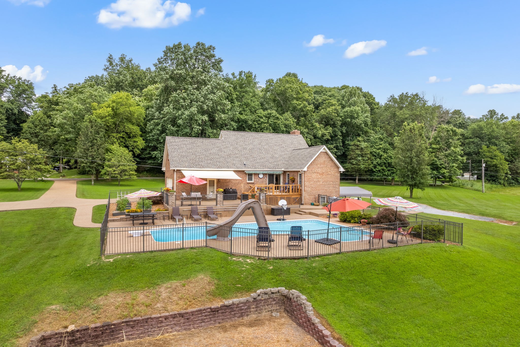 915 Rocky Hollow Road Erin, TN 37061 - Photo 2 of 49 an outdoor space with furniture and garden