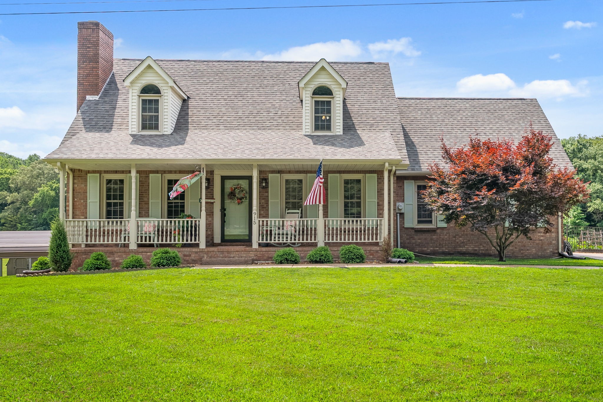 915 Rocky Hollow Road Erin, TN 37061 - Photo 2 of 49 a front view of house with yard and green space