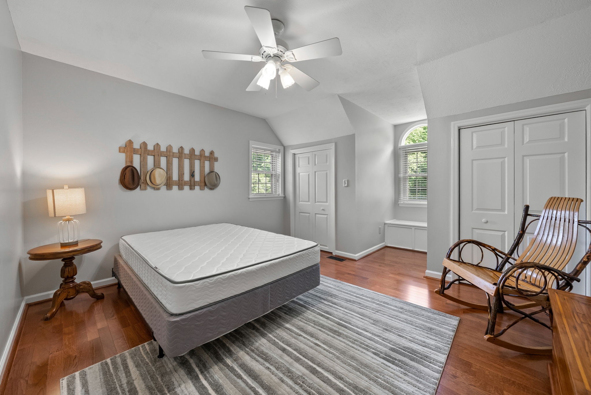 915 Rocky Hollow Road Erin, TN 37061 - Photo 25 of 49 a living room with a bed furniture and a window