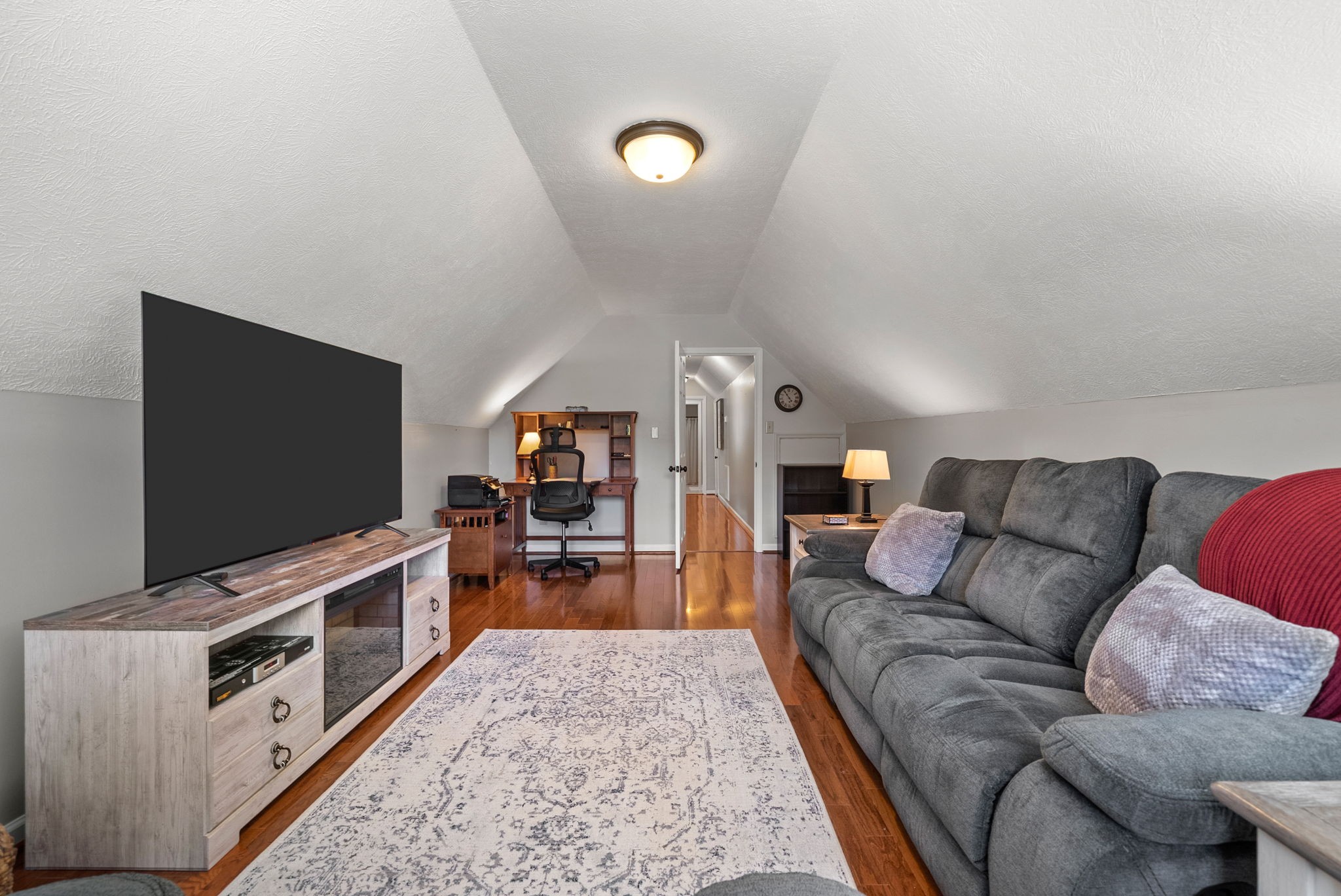 915 Rocky Hollow Road Erin, TN 37061 - Photo 29 of 49 a living room with furniture and a flat screen tv