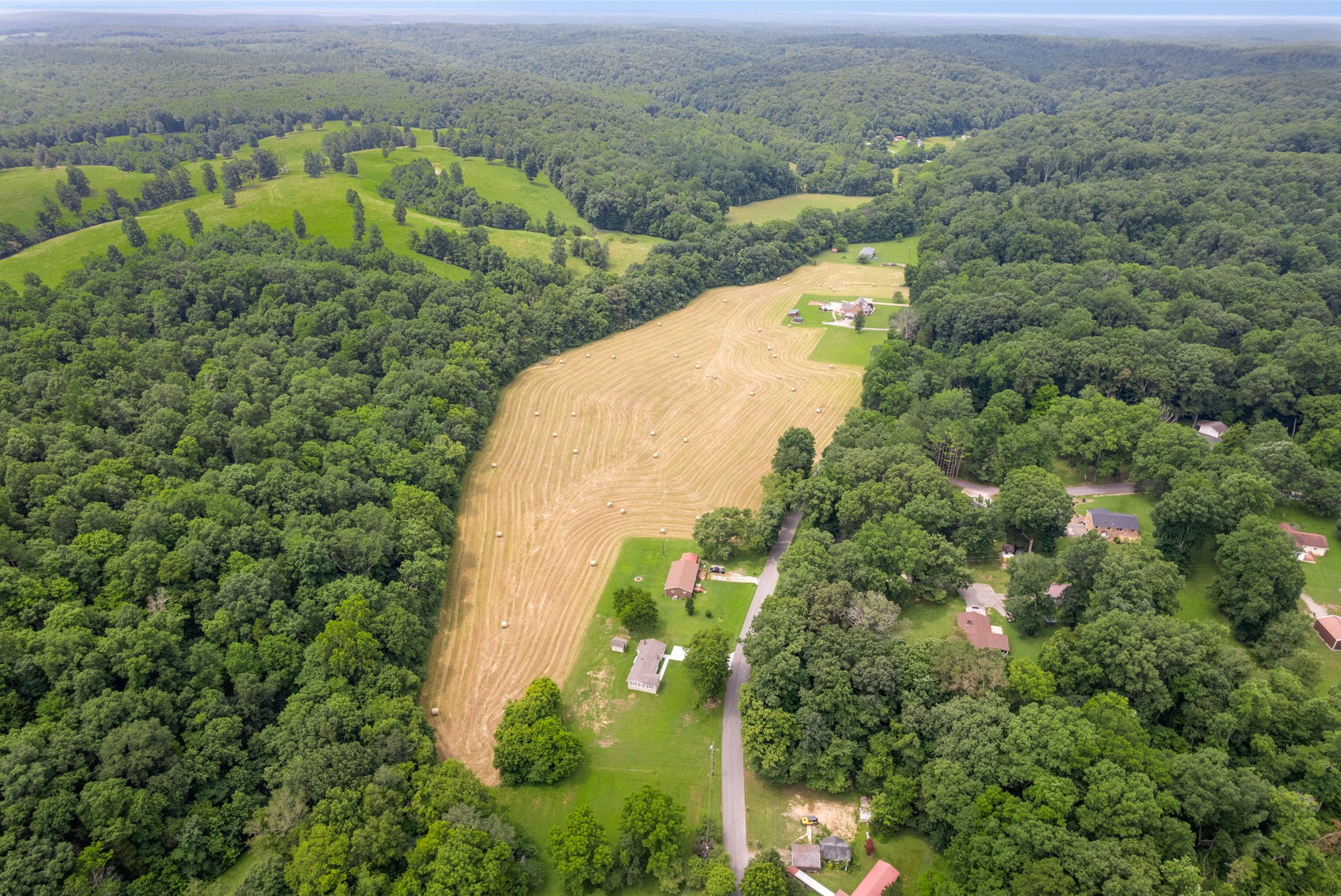 915 Rocky Hollow Road Erin, TN 37061 - Photo 39 of 49 an aerial view of a house with a yard and lake view