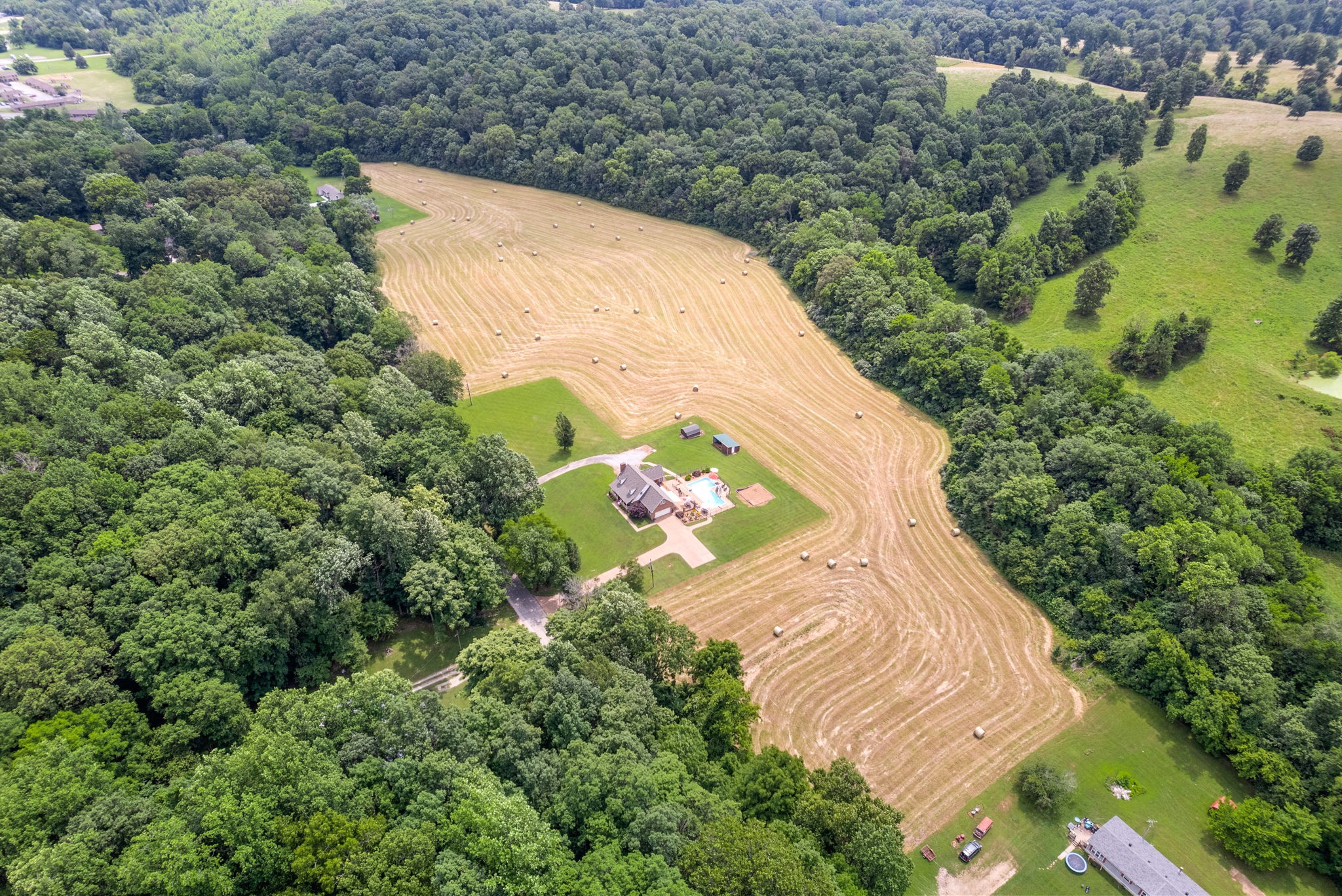 915 Rocky Hollow Road Erin, TN 37061 - Photo 39 of 49 an aerial view of a house with a yard and large trees