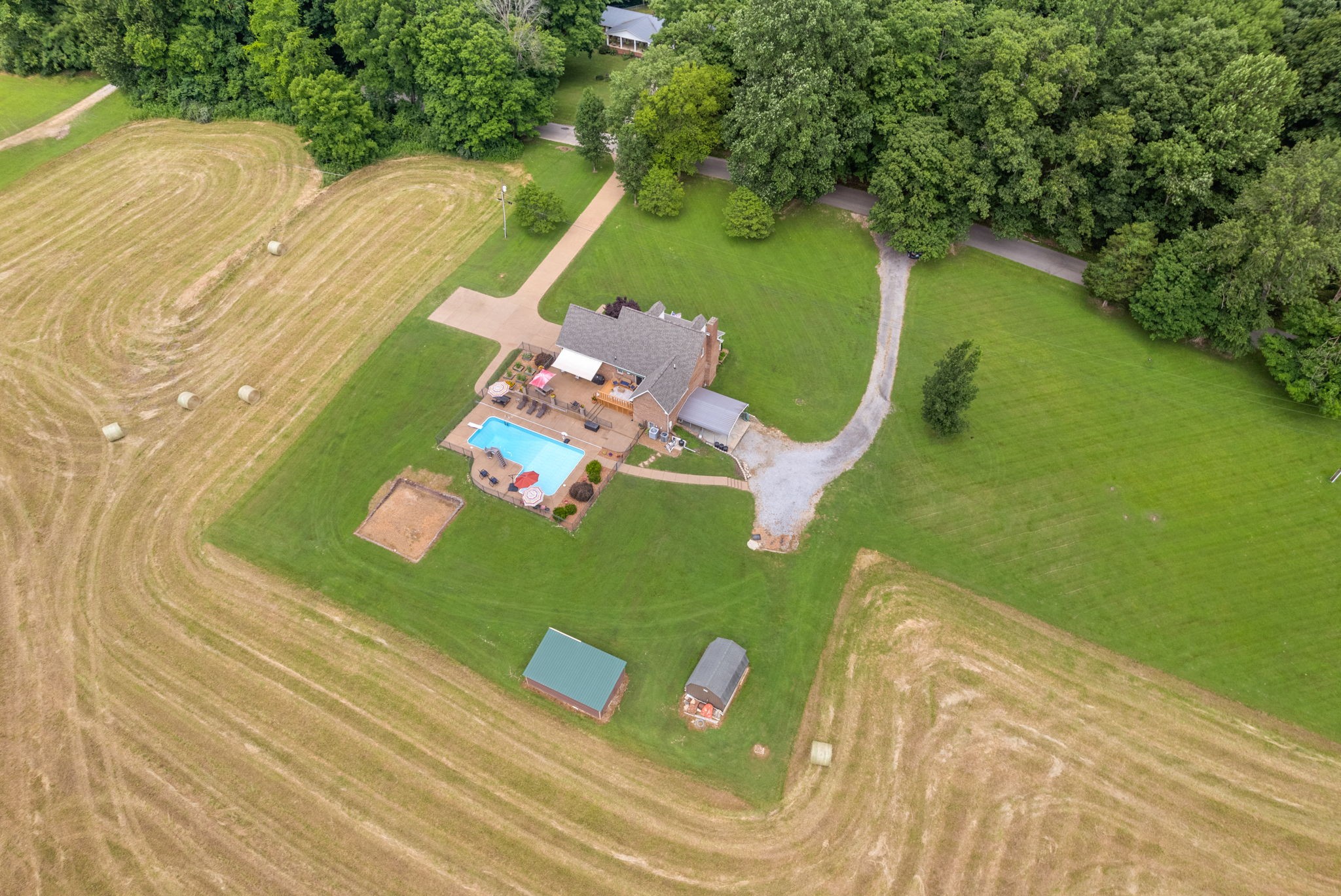 915 Rocky Hollow Road Erin, TN 37061 - Photo 41 of 49 a view of a swimming pool with a yard